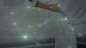 Doctor extending tablet to elderly patient, scrolling health data with overlay pulsing. Medical, technology, healthcare, digital, recovery, professionalism, modern - Powered by Shutterstock - Get 15% off with code: PIKWIZARD15