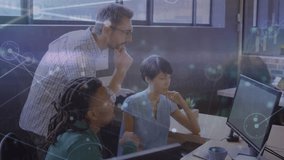 Animation of network of connections over students using computers in workers using computers. Global business global connections digital interface and technology concept digitally generated video. - Powered by Shutterstock - Get 15% off with code: PIKWIZARD15