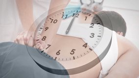 Animation of clock ticking over caucasian female physiotherapist with patient. Global computing and data processing concept digitally generated video. - Powered by Shutterstock - Get 15% off with code: PIKWIZARD15