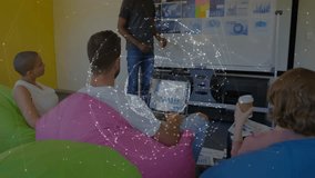 Presenter pointing graphs and displaying rotating globe overlay to illustrate business data links. Collaboration, innovation, data visualization, teamwork, digital network, modern workspace, casual - Powered by Shutterstock - Get 15% off with code: PIKWIZARD15