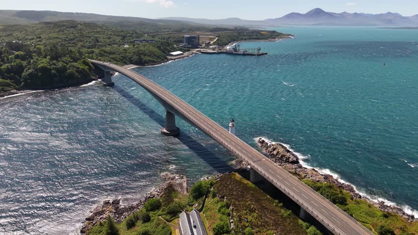 Aerial footage of Skye Bridge connecting mainland to Isle of Skye, Scotland, UK
