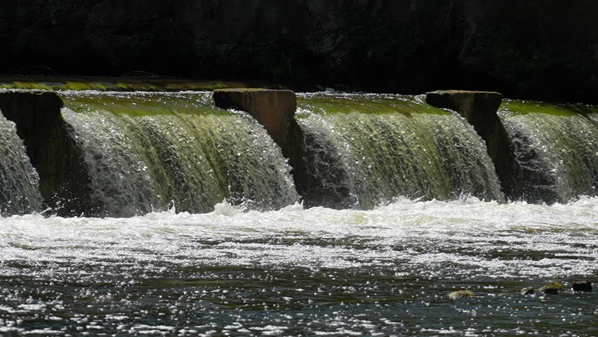 Flow of water through the spillway of a dam, 8x slow motion