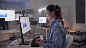 Asian woman analyzing data sales report and information sheet, comparing statistics on digital monitor, representing data analysis, overtime work, hardworking lifestyle in night office. - Powered by Shutterstock - Get 15% off with code: PIKWIZARD15