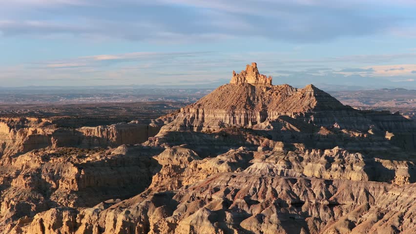 Professional drone footage captures the vast, rugged landscape and unique rock formations of Northern New Mexico. Perfect for grand cinematic establishing shots and western-themed documentaries.