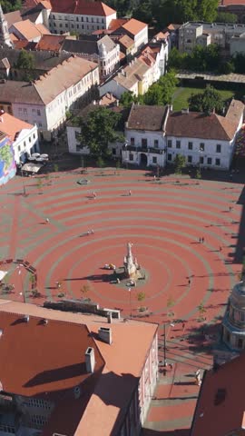 Drone view highlighting Liberty Square and its surrounding architecture in central Timișoara.