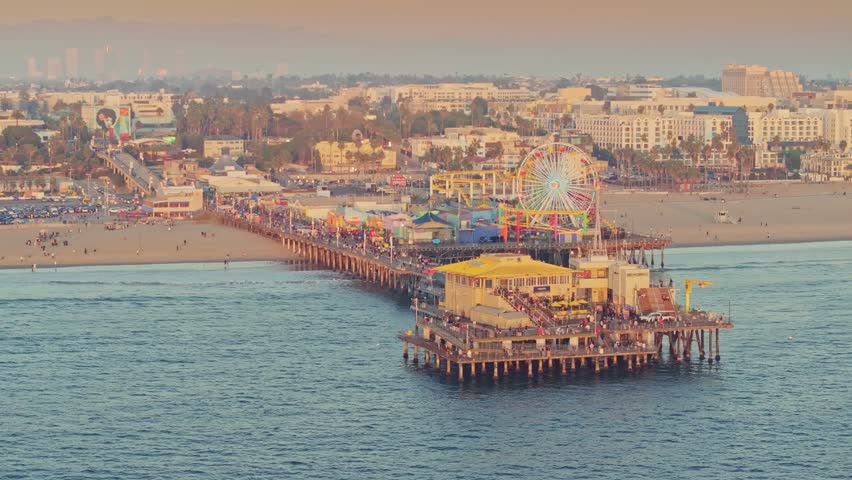 Aerial stunning sunset at Santa Monica Pier with Los Angeles skyline 
