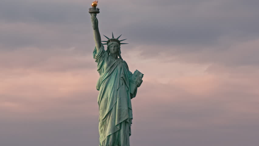 Liberty statue above NYC. New York City skyline with Liberty statue. New York City panorama with iconic America statue. New York City harbor view with America monument.