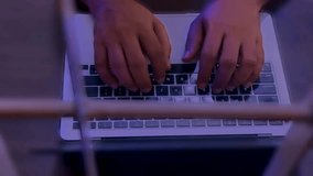 JAKARTA, INDONESIA - JANUARY 6, 2026

Top view of hands typing on laptop keyboard with purple neon lighting. Concept for programmer, hacker, freelancer, and creative digital workspace at night. - Powered by Shutterstock - Get 15% off with code: PIKWIZARD15
