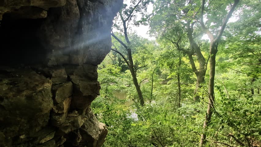 Camera Moves into a Narrow Cliff Opening at Cuivre River State Park, Missouri