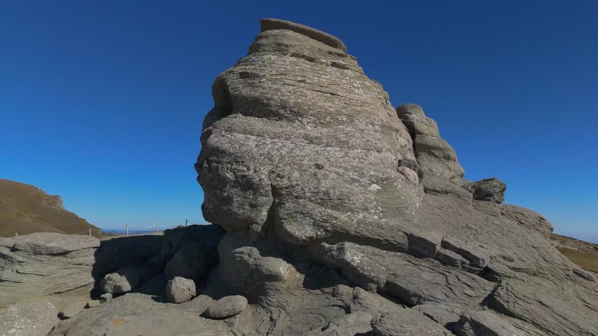 Dynamic 4K aerial drone footage starting with a tight close-up of the Sphinx