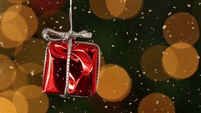 Animation of confetti falling over christmas decorations and light spots on black background. Christmas, tradition and celebration concept digitally generated video. - Powered by Shutterstock - Get 15% off with code: PIKWIZARD15