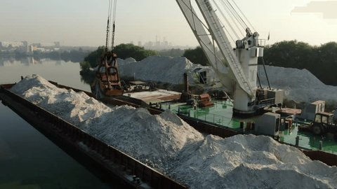 Drone Orbiting Crane on River Barge
