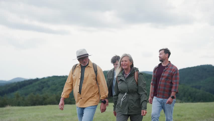 Multigenerational family on hiking trip in nature.