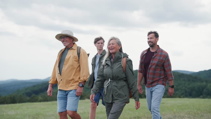 Multigenerational family on hiking trip in nature.