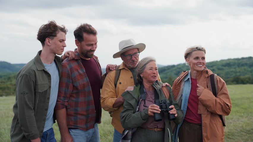 Multigenerational family on hiking trip in nature.