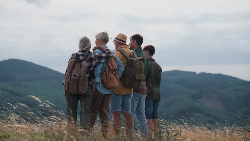 Multigenerational family on hiking trip in nature.