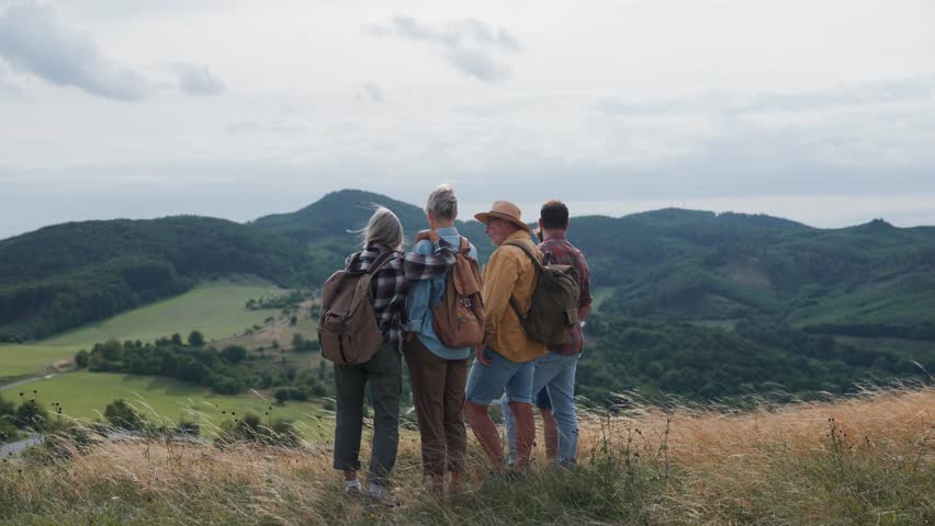 Multigenerational family on hiking trip in nature.