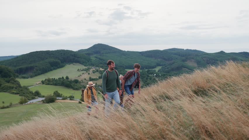 Multigenerational family on hiking trip in nature.