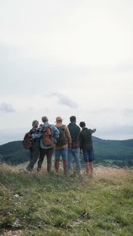 Multigenerational family on hiking trip in nature.