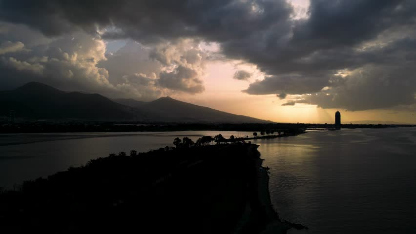 Epic Sunset with Sunbeams and Seagull Over Izmir Lagoon