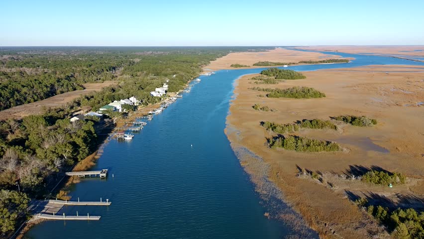 Drone clip of slow ascension over the intercostal waterway in South Carolina just before sunset.