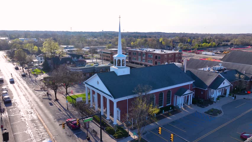 First Presbyterian Church aerial view at 200 E Main Street at Hutton Street in historic city center of Northville, Michigan MI, USA. 