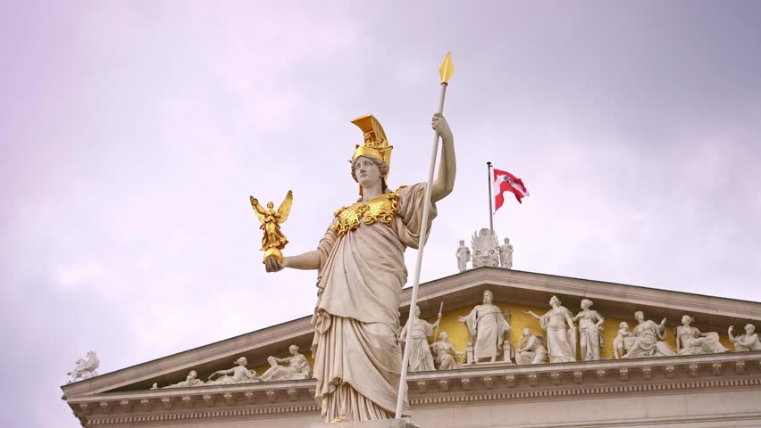 Pallas Athena Fountain statue located in front of the Austrian Parliament Building in Vienna, Austria. Travel destination for tourist visiting Austria. Europe summer tourism.