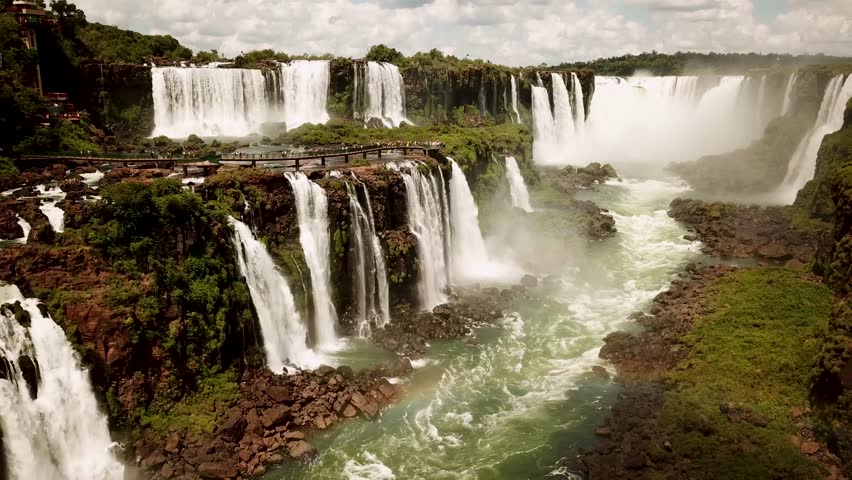 Iguazu Falls in Argentina - Brasil Border is one of the Natural Seven Wonders of the World and an UNESCO World Heritage Site. High quality 4k footage