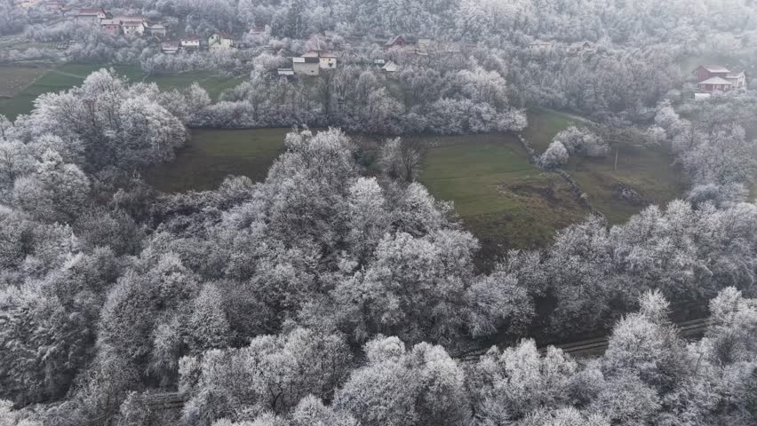 Drone Shot of Hoar Frost on Landscape on Cold Autumn Morning, White Forest Leaves and Green Meadows