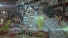 Animation of network of connections over diverse schoolchildren with teacher. school, education and digital interface concept digitally generated video. - Powered by Shutterstock - Get 15% off with code: PIKWIZARD15