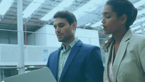 Animation of white bar graph over multiracial coworkers discussing over laptop in warehouse. Digital composite, multiple exposure, report, finance, storage, distribution and technology concept. - Powered by Shutterstock - Get 15% off with code: PIKWIZARD15