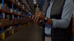 Animation of network of profile icons over caucasian male supervisor checking stock at warehouse. Global networking and transportation business technology concept - Powered by Shutterstock - Get 15% off with code: PIKWIZARD15