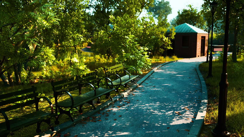A peaceful pathway winds through a lush park, lined with benches and greenery, as sunlight filters through the trees, creating a tranquil atmosphere perfect for a stroll.