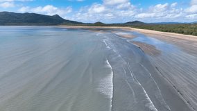Aerial cruises over Queensland's tropical Balls Bay as incoming tide advances - Powered by Shutterstock - Get 15% off with code: PIKWIZARD15