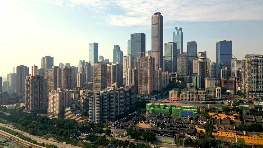 Aerial view of the Chongqing skyline with its towering skyscrapers, showcasing a blend of modern architecture and traditional structures, Chongqing, Chongqing, China.