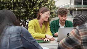 Students using laptop for exams preparation sitting outdoors in the University Campus park - Powered by Shutterstock - Get 15% off with code: PIKWIZARD15
