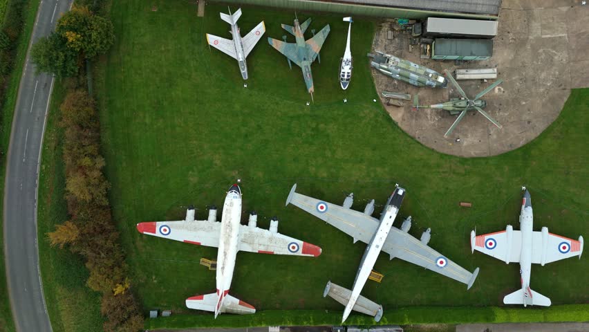 Aerial drone footage of World War Two warplanes including fighter jets and bombers flying over Lincolnshire showcasing historic aircraft in the United Kingdom