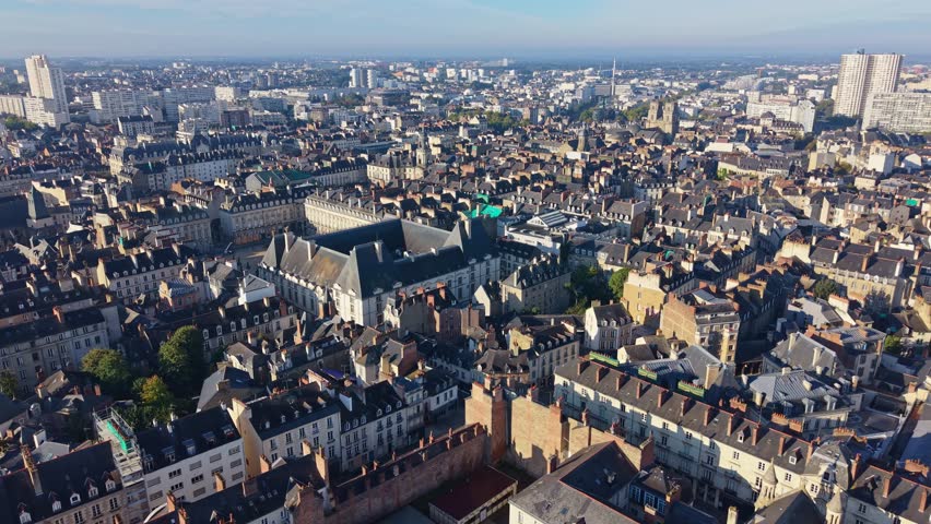 Sunny drone pan over Rennes showing Parliament of Brittany, city hall and opera. France.