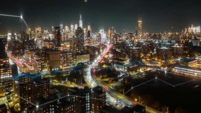 Aerial panoramic hyperlapse of New York City at night with heavy traffic on a multilane expressway, overlaid with digital lines and data visualization effects. - Powered by Shutterstock - Get 15% off with code: PIKWIZARD15