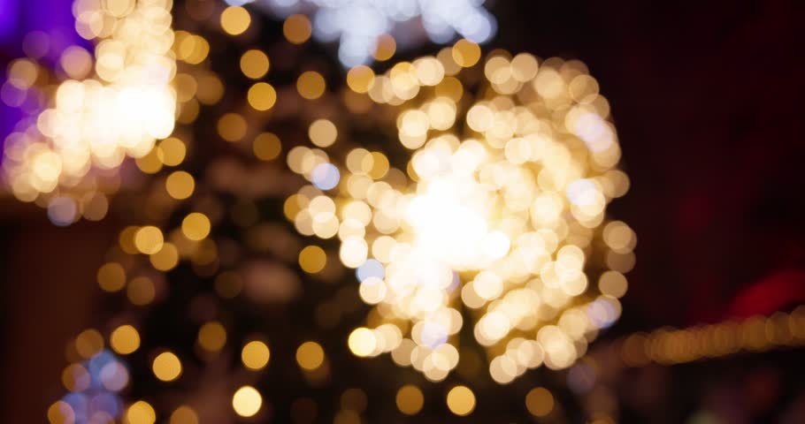 Abstract background of out-of-focus holiday lights - bokeh effect and New Year's lighting