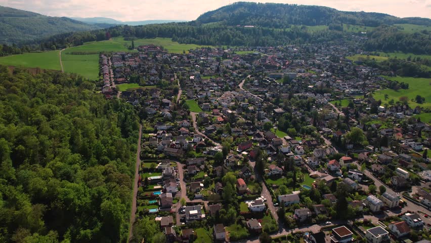 A aerial view around the city Pfeffingen in Switzerland on a sunny spring day.
