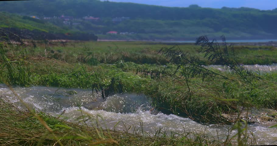 The turbulent currents at the mouth of the intertidal zone in Okinawa, Japan.