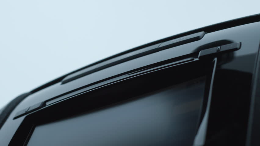 Car Stereo CD Player Compact Disc Ejecting with Mechanical Audio, Close-up