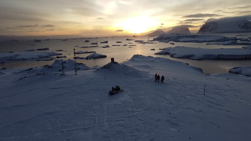Nacreous Clouds Over Antarctica with People Below, Aerial Drone View