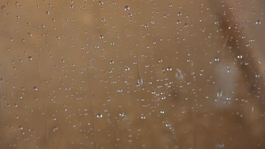 Raindrops on glass and rain,