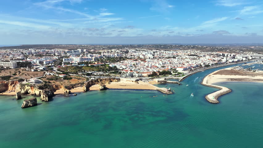 Aerial video from the touristic city Lagos on the south coast in the Algarve Portugal 