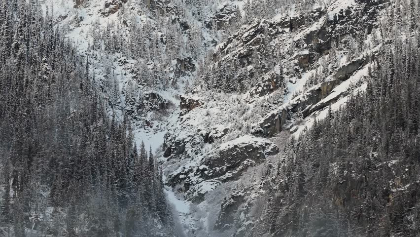 Majestic Snow-Covered Mountains and Pine Forest in Winter, British Columbia, Canada