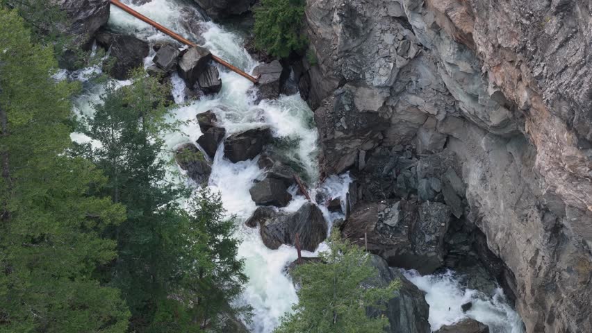 Powerful River Rapids Cascade Through a Rocky Gorge in British Columbia, Canada