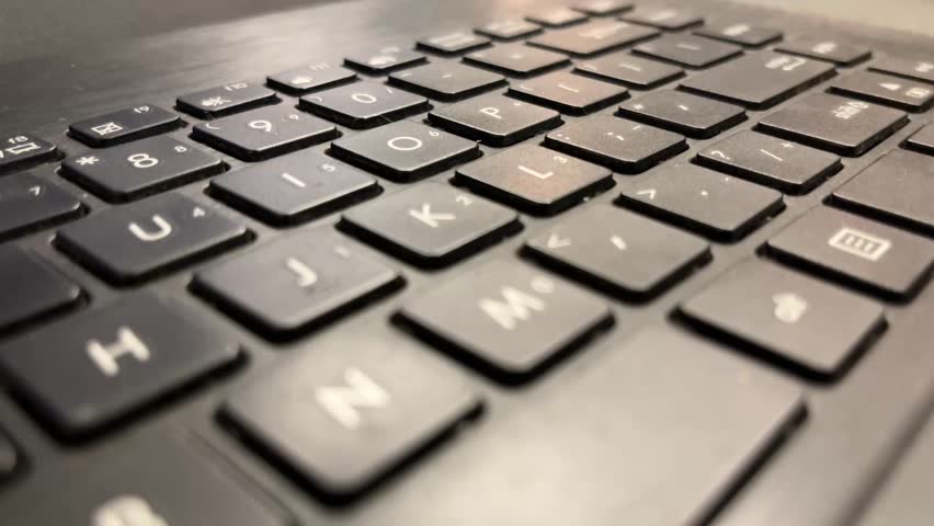 close up view of black laptop keyboard. keys. button, buttons.