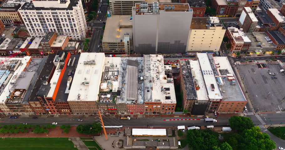 Urban cityscape of Nashville downtown district at bright sunset in Tennessee, USA. Skyline with skyscraper buildings in modern American city.